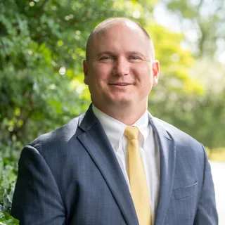 Adam G. Lee, Partner at Dobson Law Group