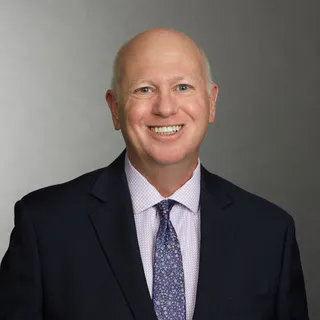 John E. Larson, team member at Evans & Mullinix, P.A.