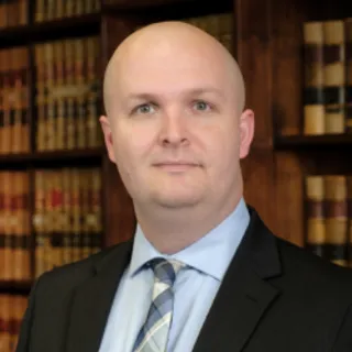 Eric M. Hartmann, Partner at Lane & Waterman LLP