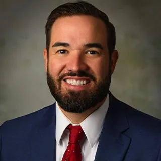 Taylor M. Hamilton, Shareholder at Morgan Pottinger McGarvey