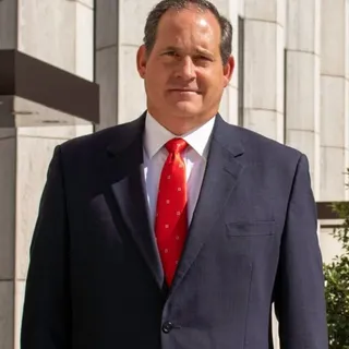 V John H. Musser, team member at Murphy, Rogers, Sloss, Gambel & Tompkins