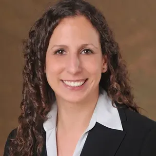 Catherine A. Scarminach, Partner at Novit & Scarminach, P.A.